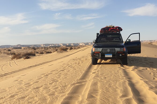 3 Days 2 Nights Black and White Desert Tours Experience - Day 1 in the Black Desert: Crystal Mountain and Al Aqabat Valley Camp