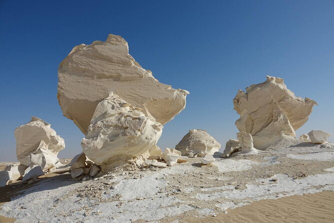 3 Nights 4 Days White Desert Camping Trip - New White Desert: flower stones, pale rock shapes, and Green Spring lunch