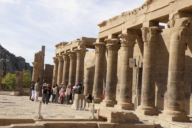4 Days Nile Cruise From Aswan with Abu Simble and Balloon - Luxor East and West: Karnak, Luxor Temple courtyard, and a galabya party