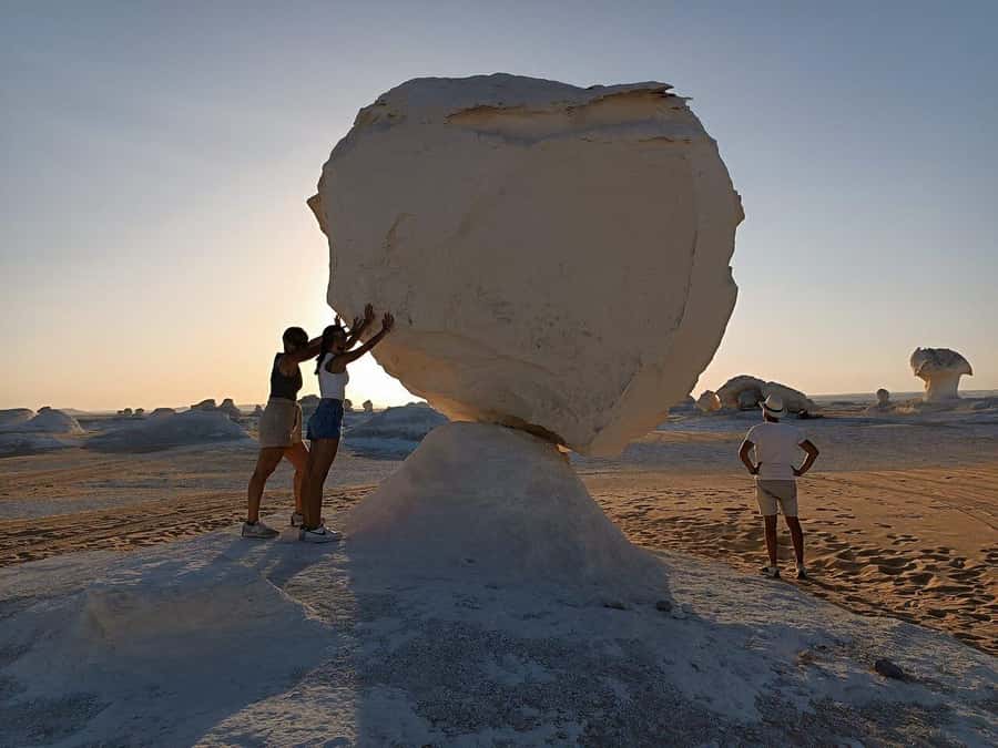 Cairo: Bahariya Oasis & White Desert A Private Day Adventure - Black Desert and Black Village: Where the Sunset Turns the Badlands Dramatic