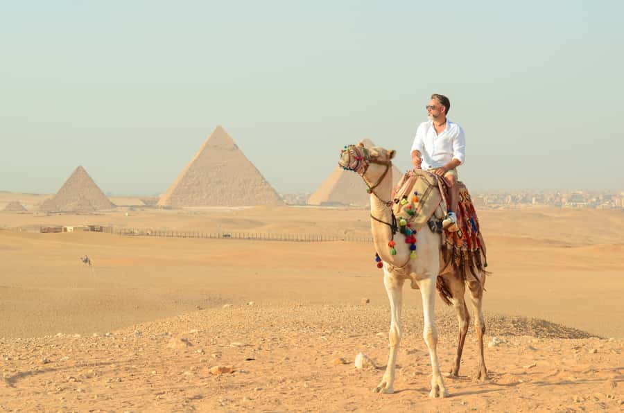 Cairo: Camel Ride Around The Pyramids with Hotel Pickup - What the Guide Adds: History, English Support, and Practical Help