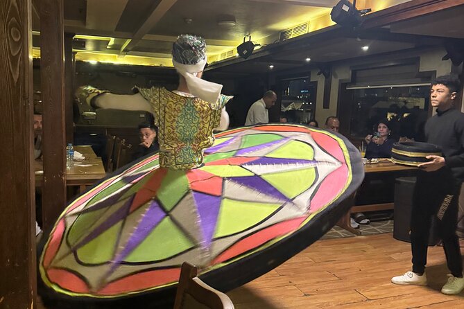 Cairo Dinner Cruise on the Nile with Pickup - Belly Dancing, Tanoura, and Live Music: The Show Part of the Night