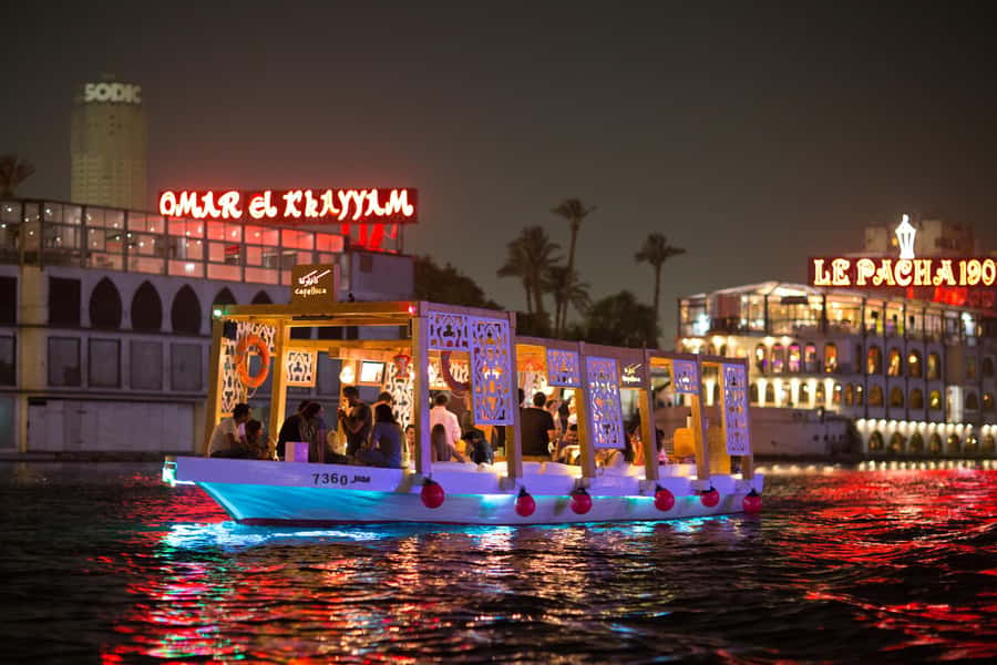 Cairo: Private Felucca Ride, All You Can Drink only - Cairo skyline from the Nile: bridges, hotels, and that sunset-to-night shift