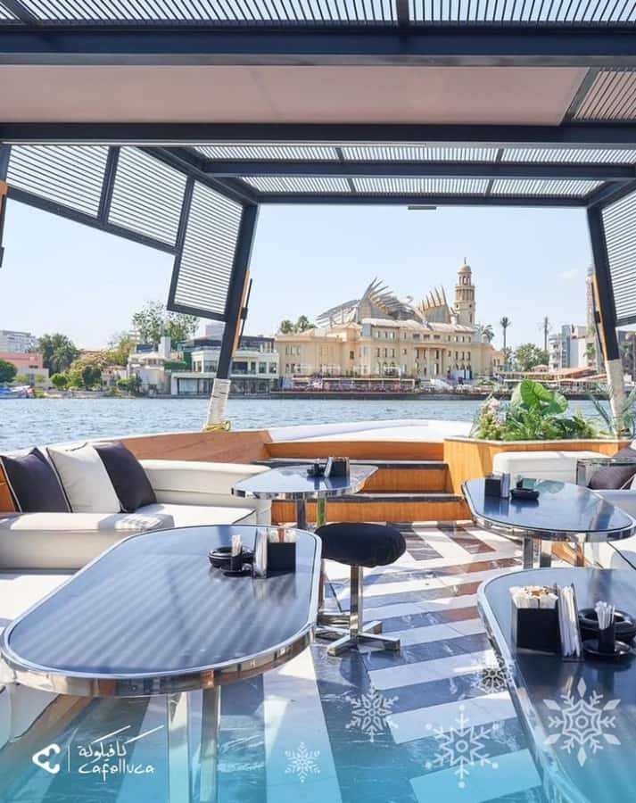 Cairo: Private Felucca Ride with Dinner and Drinks - Cairo skyline views from the water: hotels, bridges, and night photos
