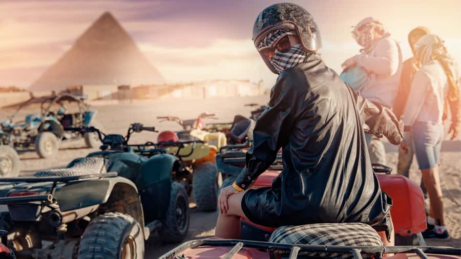 Cairo: Private Quad Bike Desert Tour with Pyramids & Sunset - Private transfers, English escort, and the multilingual advantage