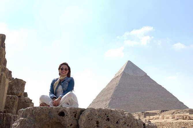 Day Tour to Giza Pyramids and The Grand Egyptian Museum - Camel ride around the pyramids: fun photos with a reality check