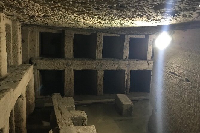 Day Trip to Alexandria from Giza & Cairo by Pharaohs Tours - Kom el Shoqaffa Catacombs: Spiral Descent and a Strange Mix of Symbols
