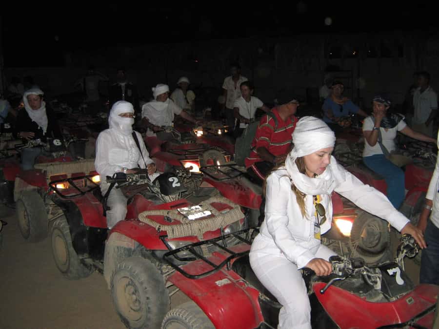 Desert Sunset Quad Bike ATV for 50Km, Oriental Show, Dinner, - Bedouin village stop: tea, desert life, and a camel ride that’s brief