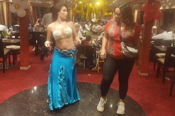 Dinner Nile Cruise belly dancer open buffer tanora show sailing on Nile - Why this Cairo Nile dinner cruise works as a first-night plan