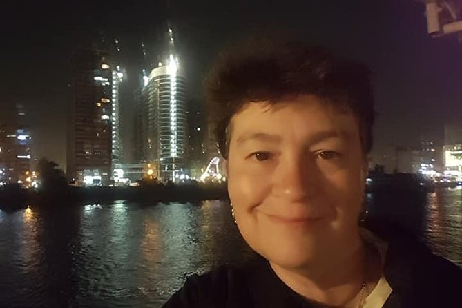 Dinner Nile Cruise belly dancer open buffer tanora show sailing on Nile - Night skyline views: Cairo from the waterline