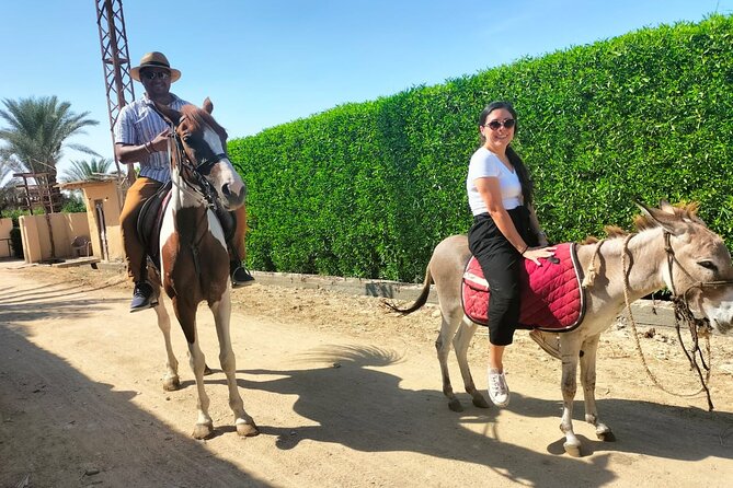 Enjoy Fayoum & Sandboarding with Egyptian Lunch at Tunis village. - Fayoum in One Long Day: Lake Qaroon, Wadi El Rayan, and Dunes