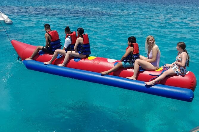 Full-Day Experience with Dolphins and Snorkeling in Red Sea - Snorkeling with coral and fish: what two stops really buys you