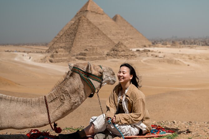 Giza Pyramids Photoshoot with Jumping Horse, Camel and Sphinx - Stop 2: panoramic views, camel ride, and the jumping horse setup