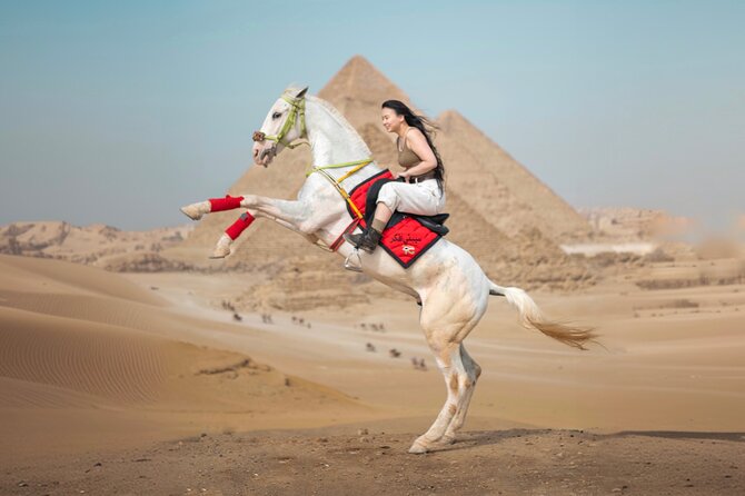 Giza Pyramids Photoshoot with Jumping Horse, Camel and Sphinx - What to wear for culturally appropriate jumping-horse and pyramid photos