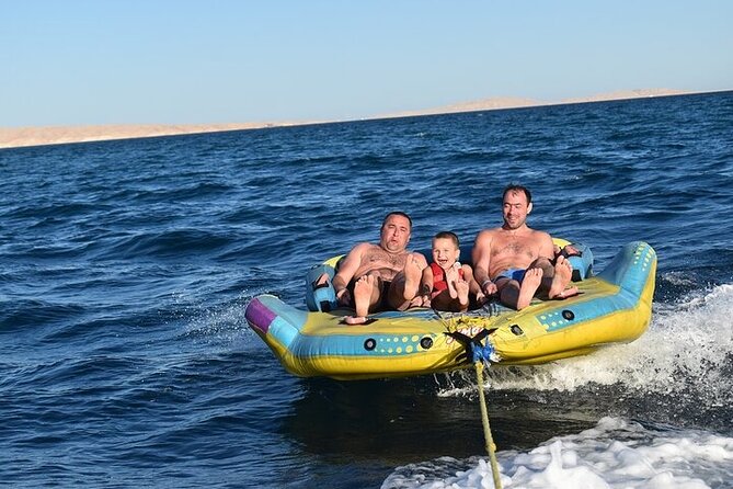 Hurghada Dolphin House: Full-Day Snorkeling & Boat Experience - Snorkeling in the Red Sea: coral, fish, and a safety-first crew