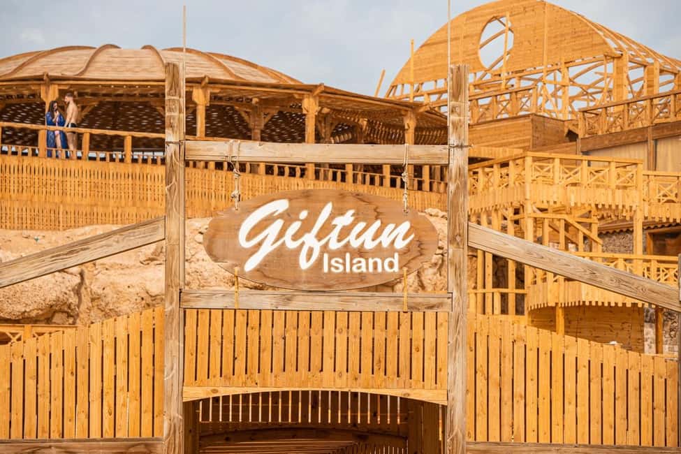Hurghada: Giftun Island with breakfast, lunch & Water Sports - Orange Bay Island beach time: relaxing, swimming, and photo reality