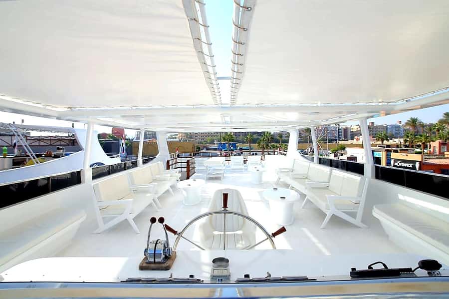 Hurghada: Orange & Giftun Island Cruise with Massage & Lunch - Water sports: banana boat fun with minimal fuss