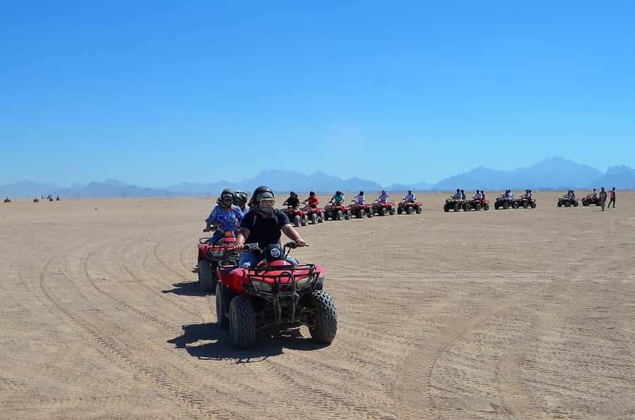 Hurghada: Red Sea Desert Quad Biking Tour & Sand Mountain - The Sand Mountain Stop: Tea, Climbing, and Worth-It Photos