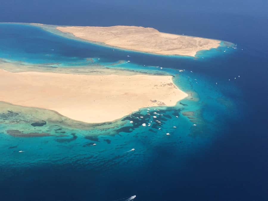 Hurghada: Snorkelling Trip by Speedboat with Hotel Pickup - Onboard comfort: shade, music, fruit, and drinks that keep the day easy