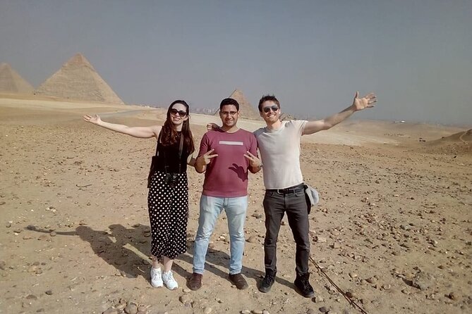 Layover tour to Giza Pyramids & Egyptian museum - Egyptian Museum highlights: gold mask, papyrus, coins, and sarcophagi