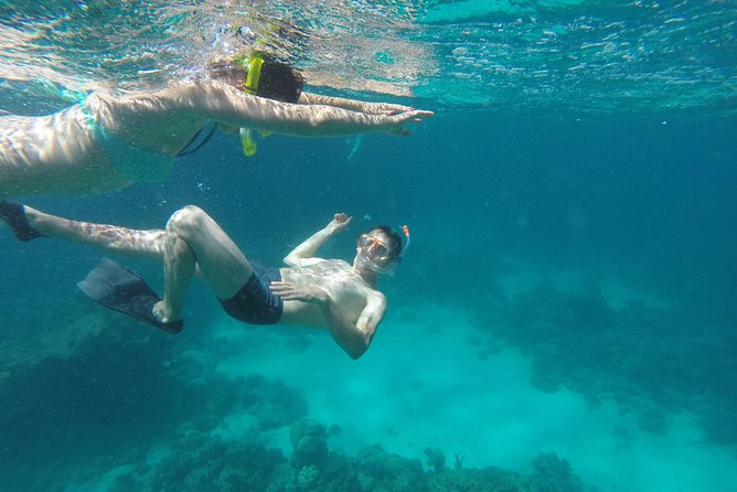 Orange Bay Snorkeling Sea Trip & Water Sports Banana boat & Quadra -Hurghada - Orange Bay sand + reef time: best ways to use the 2-hour island window