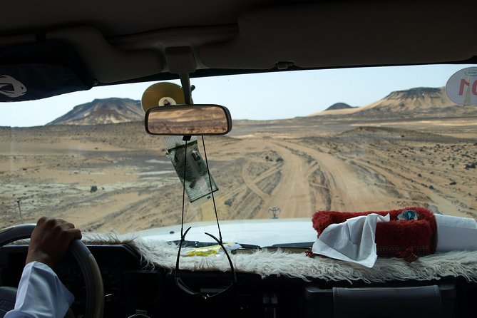 Private 2-Day White Desert and Bahariya Oasis Trip from Cairo - Entering White Desert National Park: spires, mushrooms, and animal shapes