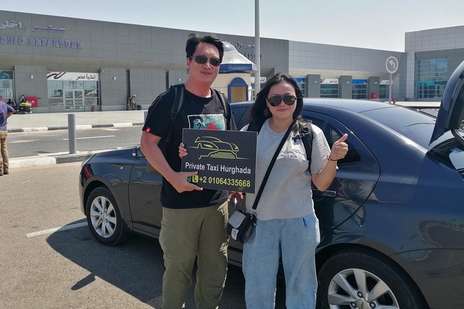 Private Airport Pickup to Makdi, Sahl hashish, Elgouna - Meeting Your Driver in the Arrival Hall (Names Visible, Bags Covered)