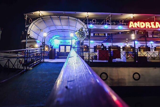 Private Cairo Nile Cruise 5 stars with Dinner - The boat dinner setup: buffet food and a live show in the same slot