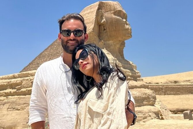 Private Day Tour Giza Pyramids, Egyptian Museum &Khan El-Khalili - Entering Giza: Great Pyramid of Khufu, Sphinx, and the Valley Temple flow