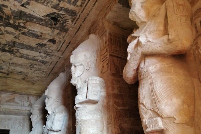 Private Day Trip to Abu Simbel from Luxor by vehicle - Arriving at Abu Simbel: the cliff, the faces, and the story