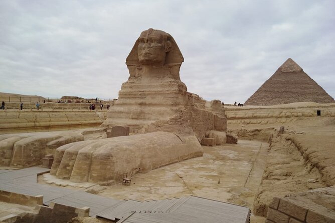 Private Full Day Tour Giza Pyramids Sphinx Saqqara and Memphis including Lunch - Giza Plateau morning: Great Pyramids of Khufu, Khafre, Menkaure and the Sphinx