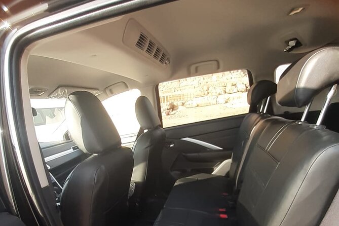 Private Giza Pyramids,Sphinx,camel,lunch, 2 tombs,Great Pyramid - Getting there from Cairo: pick-up, AC comfort, and quick context