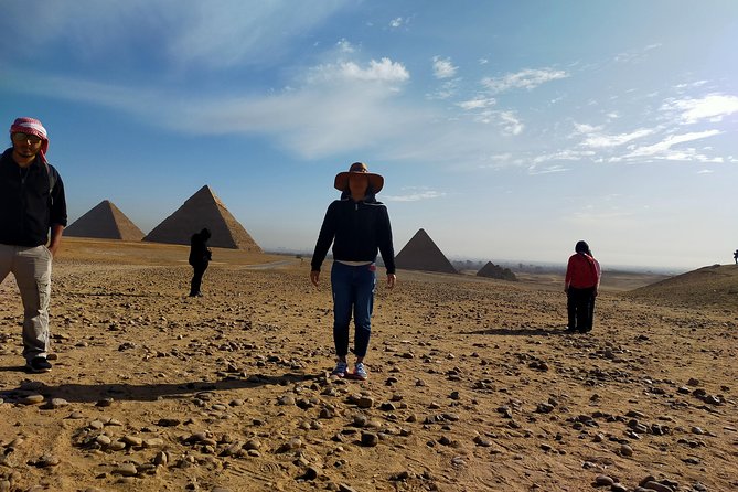 private guided tour Giza Pyramids,Sphinx and Egyptian Museum - Giza Plateau magic: Great Pyramid first, then the Sphinx approach