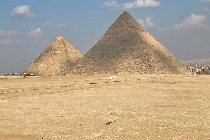 Private Tour to Giza Pyramids, Sphinx & Camel Ride at Sunrise - Great Sphinx close-up: lion body, human head, and smart photo timing