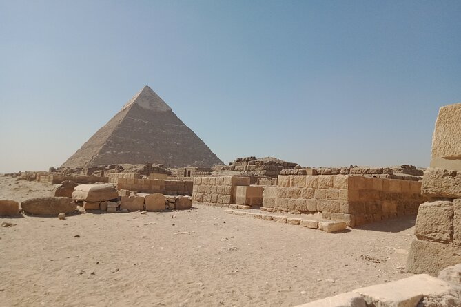Private Tour to the Pyramids of Giza, Djoser and Dahshour - Giza Pyramids first: Cheops, limestone blocks, and a quick camel break