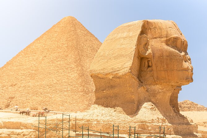 Pyramids Sphinx Camel Ride Egyptian Museum Bazar private day tour - Giza Plateau: Great Pyramid views, Sphinx stops, and a 20-minute camel loop