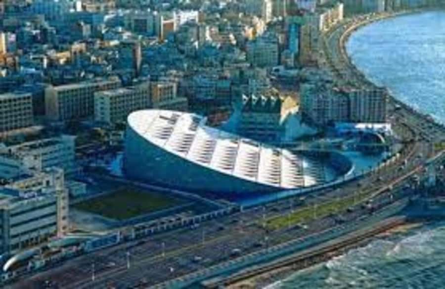 Royal Alexandria Day Trip: An Exclusive VIP Experience - Harbor scenes, corniche atmosphere, and the Stanley Bridge pass-by