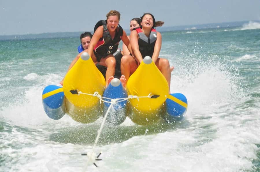 Sharm: Banana, Sofa Boat or Parasailing watersports & pickup - Hotel pickup and shared coach timing: plan for a wide window