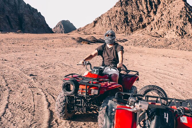 Sharm: Quad Bike or Car Buggy, Camel ride & optional VIP Bedouin Dinner & Show - The mountain photo stop and the echo-sound moment