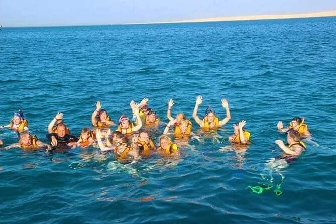 Swimming with Dolphins and Banana Boat Sea Trip Day Experience - Hurghada - On-board comfort: snacks, coffee/tea, lunch, and places to relax