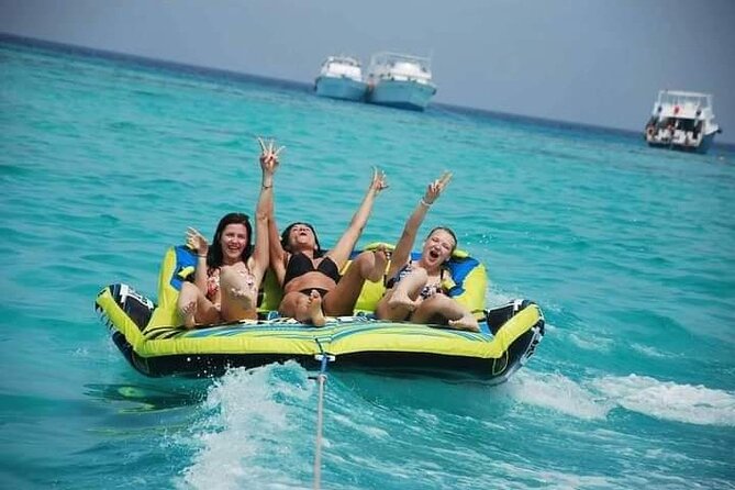 Swimming with Dolphins and Banana Boat Sea Trip Day Experience - Hurghada - Crew, organization, and the loud-music variable