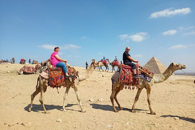 Thrilling Half-Day: Discover Pyramids, Sphinx, Camel Ride& Lunch! - Stop 1: Great Pyramids of Giza, Valley Temple of Khafre, and the Sphinx You Can Actually See