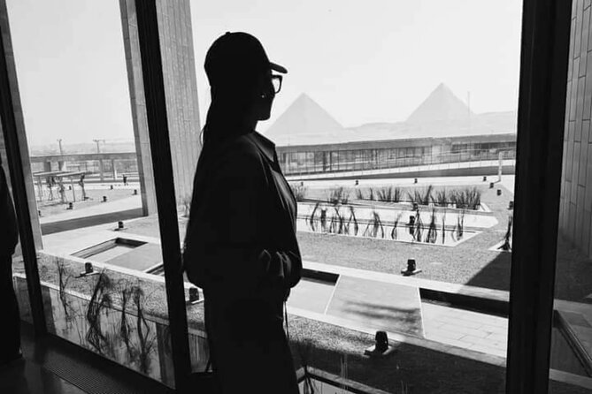 Tour to Giza pyramids, sphinx, and New grand Egyptian Museum GEM - Great Sphinx: lion body, human face, and nearby temple context