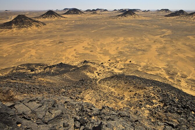Two days camping in Black & White Desert From Cairo - The Black Desert shift: volcanic rocks, golden sand, and bigger contrast