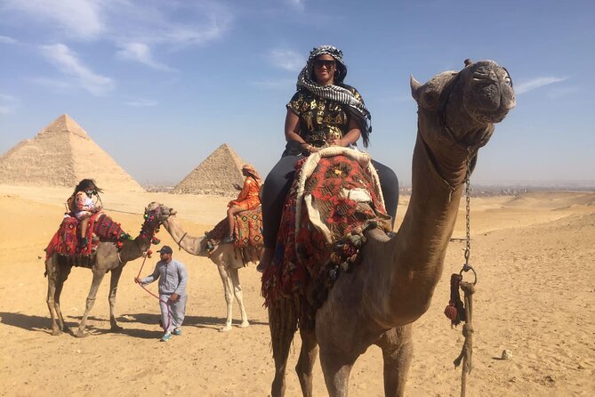 VIP Half Day Tour Giza Pyramids ,Great Sphinx and Cairo Food Tour - Stop Two at Night: The Light and Sound Show at Giza