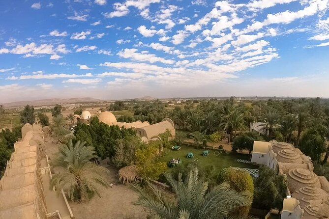 White Desert & Bahariya oasis 3 days 2 nights Tour from Cairo - Day 1 in Bahariya: springs, English Mountain sunset, and Bawiti’s old bones